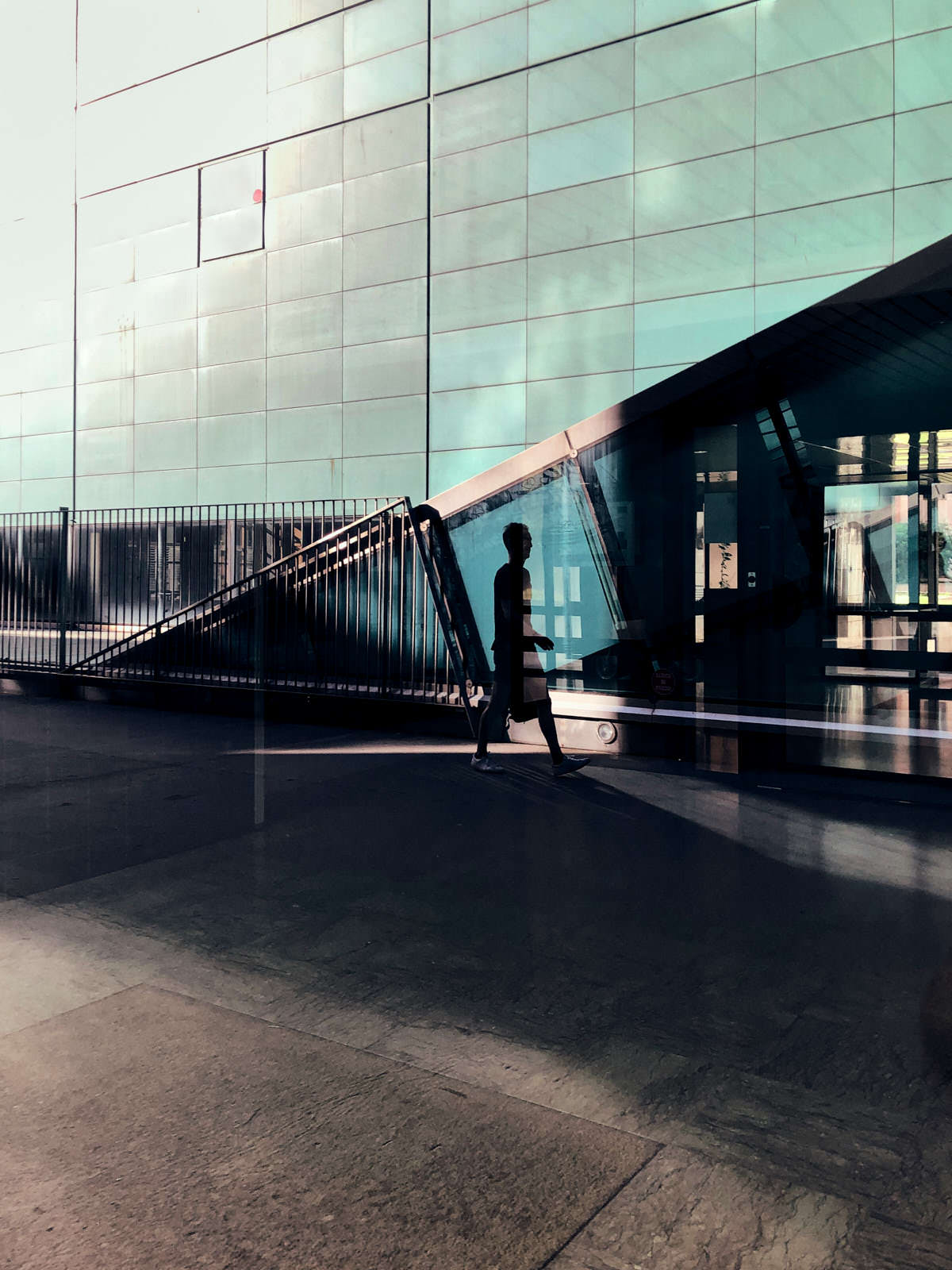 street photography reflection from a window