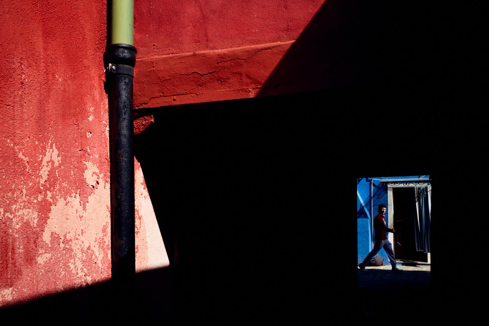 geometrical street photography in colour in burano venice italy